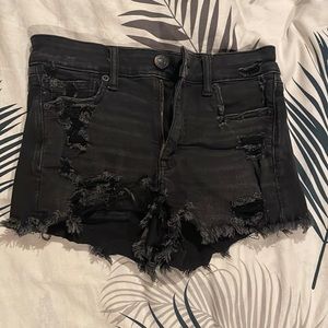 Distressed black short shorts
